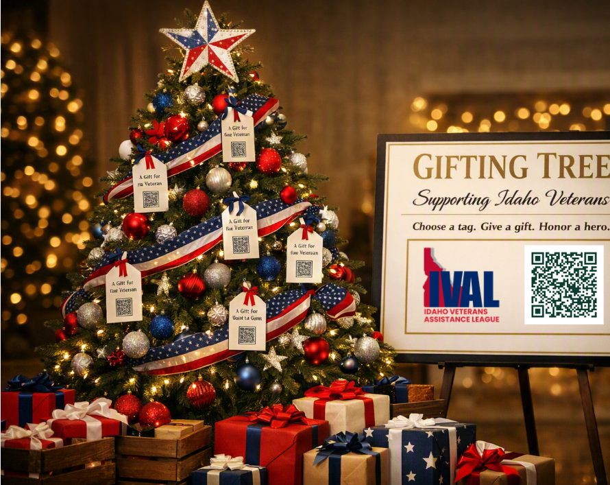 A red, white, and blue Gifting Tree decorated with 'A Gift for our Veteran' tags, beside an official IVAL (Idaho Veterans Assistance League) Gifting Tree sign with QR code